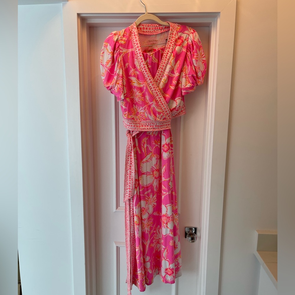 Lilly Pulitzer size medium two piece set.  Pink tropical.  Excellent condition.